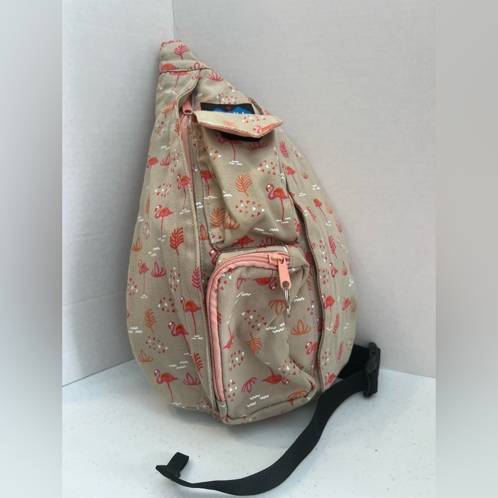 Kavu Beige Flamingo Print Sling Backpack with Pink Accents